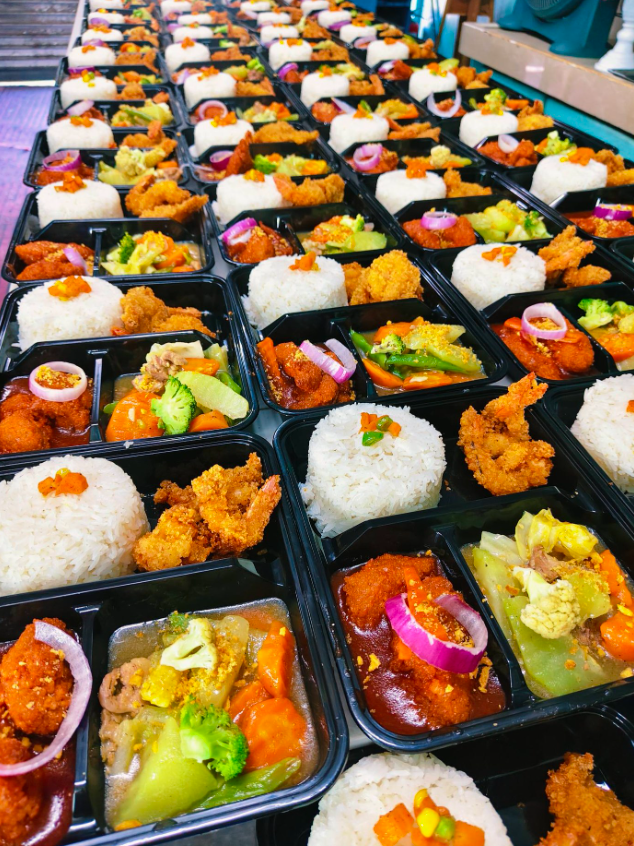Halal bento meals — rice, fried chicken, sides